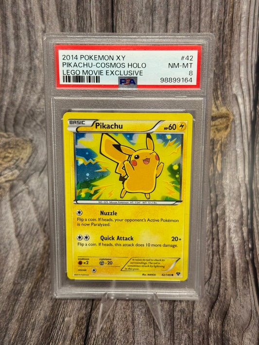 Pikachu 42/146 Cosmos Holo Lego Movie Exclusive - 2014 Pokemon XY - PSA NM-MT 8
